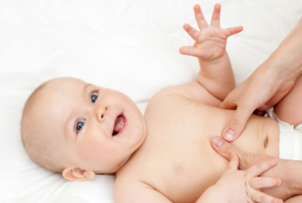 Baby massage on belly